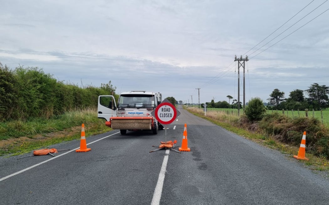 Cordon at intersection of Eltham and Hastings Road - kilometres down the road from the crash site.