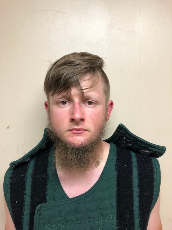 A handout booking photo released by the Crisp County Sheriff's Office shows 21-year-old shooting suspect Robert Aaron Long.
