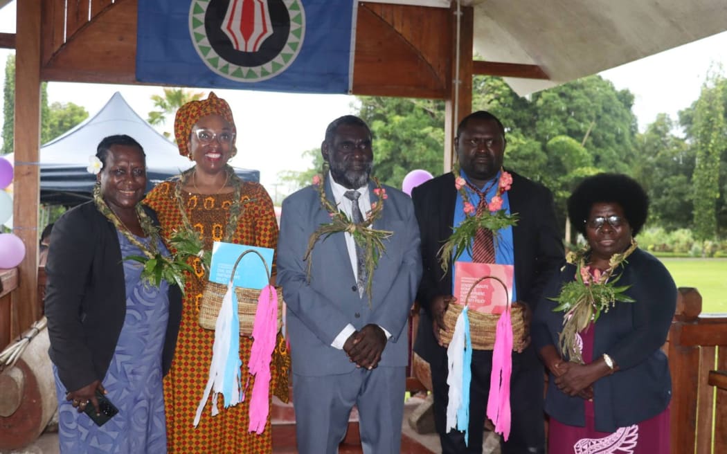 Caption: (from L-R) National Member for North Bougainville Hon Francesca Semoso, UN Women Country Representative to PNG Adekemi Ndieli, President of AROB Hon Ishmael
Toroama, ABG Minister for Community Development Hon Morris Opeti and Deputy Speaker of the Bougainville House of Representatives Hon Theresa Kaetavara at the launching of the policies in Buka.