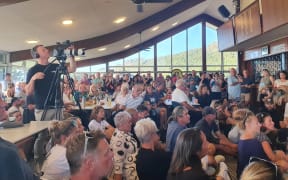 Hundreds of residents of the cyclone-hit Auckland suburb of Muriwai packed into the local golf club to meet with council staff.