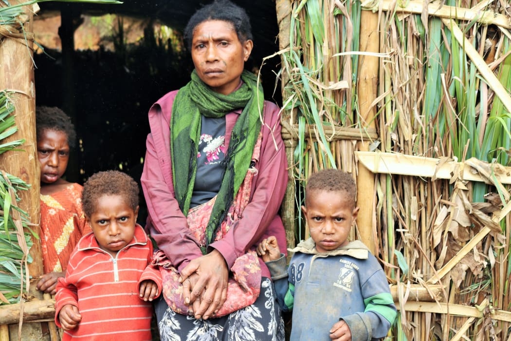 A family in PNG's Highlands following the 7.5 quake