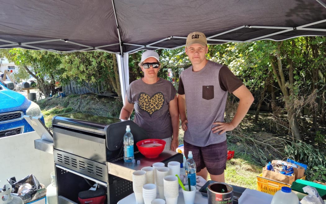 Amy and Tyler Andrew came from Taradale to run the bbq for those cleaning up
 in Waiohiki on Saturday.