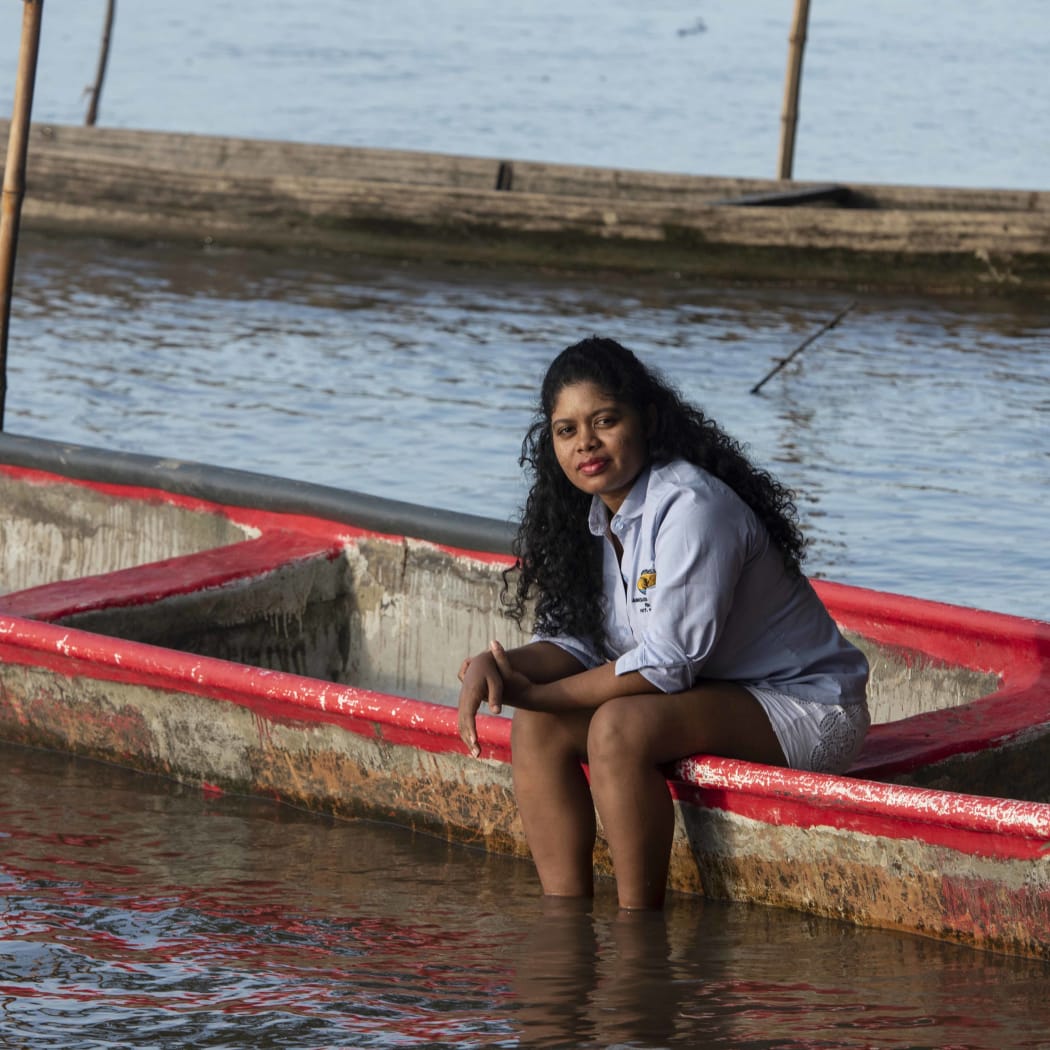 Puerto Wilches, Santander. COLOMBIA. Yuvelis Morales Blanco: A winner the 2026 Goldman Environmental Prize. Yuvelis sitting in a boat on the Magdalena River in front of her house.