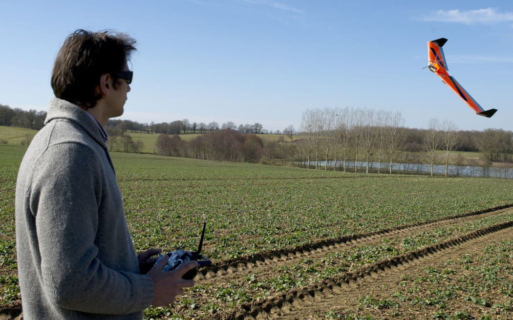 Airinov's commercial director, Romain Faroux, flies a drone which records data for an agronomic analysis of crops, providing farmers with information to optimide the use of fertilisers, and pesticides.