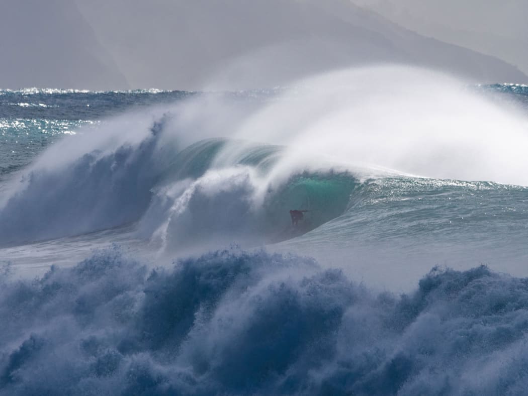 Surfing a huge storm swell at Mahia on May 27