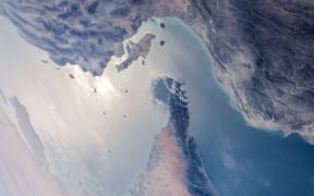 This handout photo released by NASA and taken on April 8, 2021 by the Expedition 64 crew from the International Space Station shows a view of the Strait of Hormuz in the Gulf separating Iran (top) from the United Arab Emirates and Oman (bottom). (Photo by NASA / AFP) / RESTRICTED TO EDITORIAL USE - MANDATORY CREDIT "AFP PHOTO /NASA/HANDOUT " - NO MARKETING - NO ADVERTISING CAMPAIGNS - DISTRIBUTED AS A SERVICE TO CLIENTS
