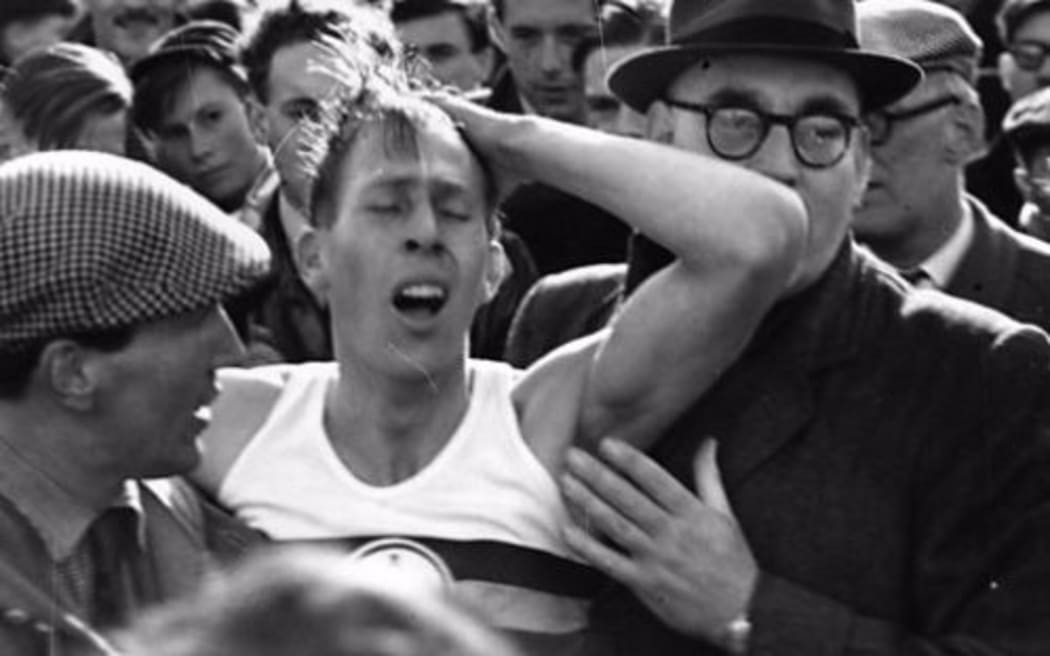 Sir Roger Bannister after completing his record breaking mile.