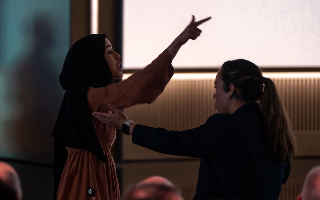 A protestor confronting Microsoft AI chief executive Mustafa Suleyman during an event highlighting Microsoft Copilot agents, the company's AI tool, on 4 April, 2025 in Redmond, Washington.