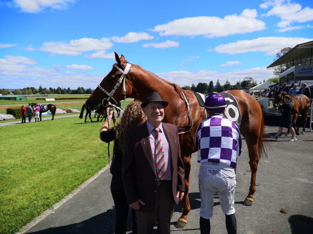 Horse  trainer Cliff Goss with his horse,  Gold Watch after another win