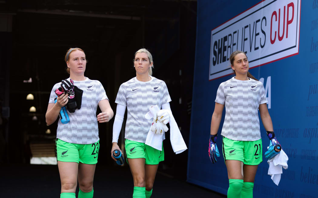 Football Ferns goalkeepers in 2022, Lily Alfeld, Erin Naylor (centre) and Vic Esson exit the players tunnel.