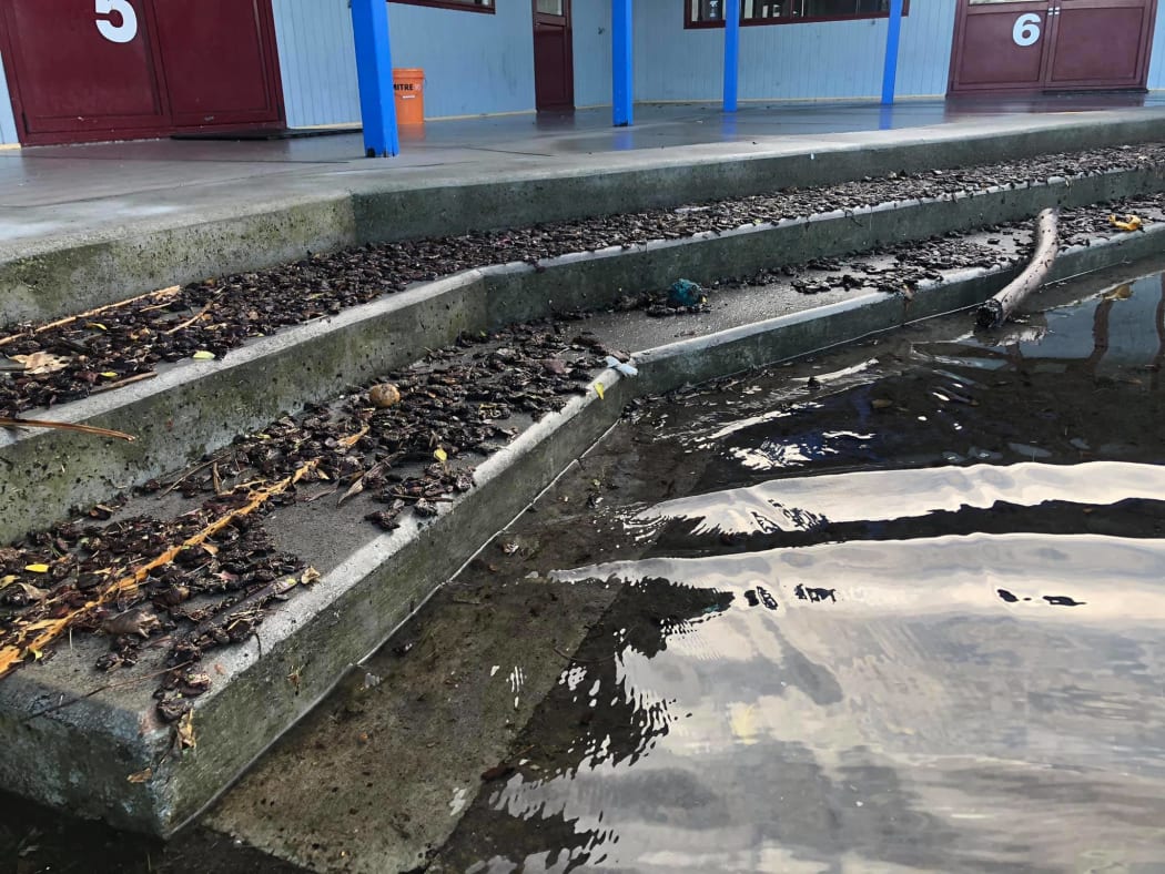 Debris is floating all over Henry Hill School after heavy rain swamped the school.
