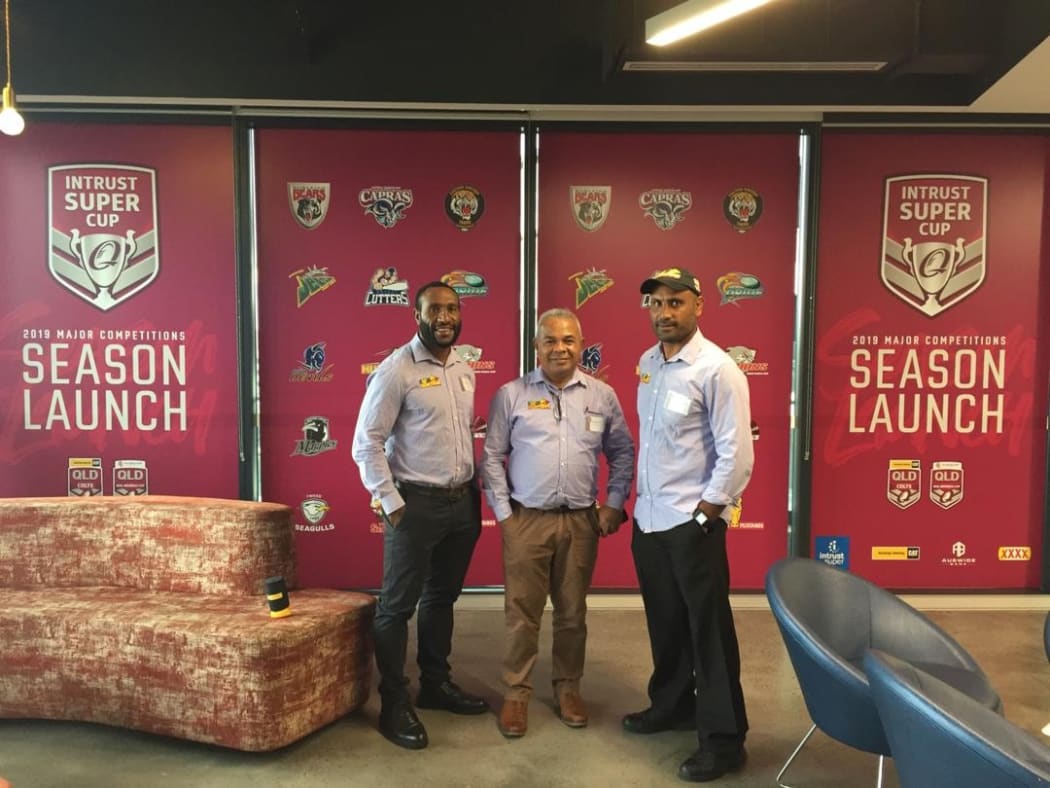 PNG Hunters captain Adex Wera, PNGRFL CEO Reatau Rau and coach Michael Marum.