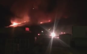 A screenshot from a Facebook Live video of the fire posted by Gisborne mayor Meng Foon