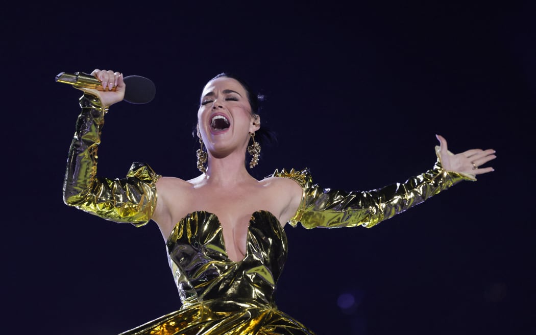 US artist Katy Perry performs inside Windsor Castle grounds at the Coronation Concert, in Windsor, west of London on May 7, 2023. For the first time ever, the East Terrace of Windsor Castle will host a spectacular live concert that will also be seen in over 100 countries around the world. The event will be attended by 20,000 members of the public from across the UK. (Photo by Chris Jackson / POOL / AFP)
