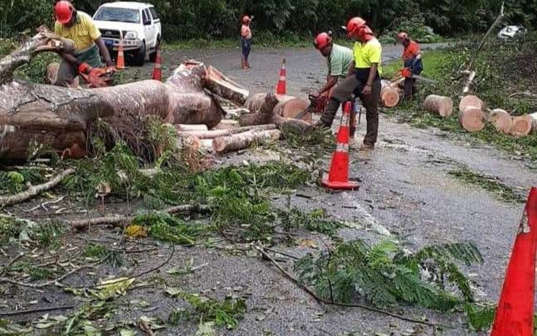 Clearing debris after Cyclone Sarai in Fiji.