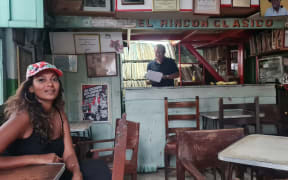 Kadambari Raghukumar at a local vinyl and cassette bar dating back to the early 60s Colombia