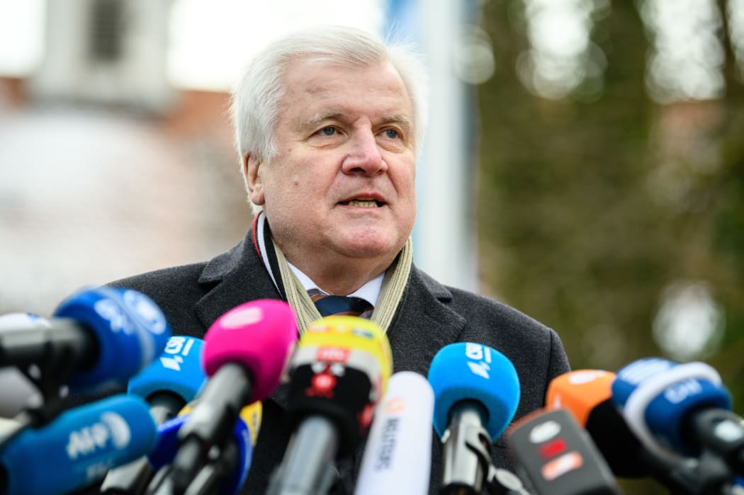 German Interior Minister Horst Seehofer, outgoing leader of the conservative Christian Social Union (CSU) party, gives a statement as he arrives for the CSU parliamentary group's retreat at Kloster Seeon monastery in Seeon, southern Germany, on January 3, 2019.