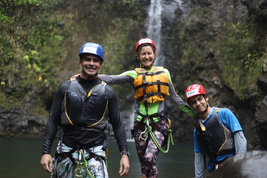 New Zealander Amanda Ellis (centre) with husband Keric and son Mitchell in Hawai'i.