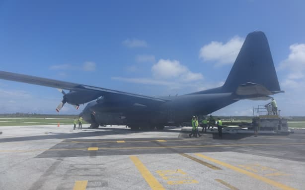 A NZ Airforce Hercules drops aid in Tonga after Cyclone Gita