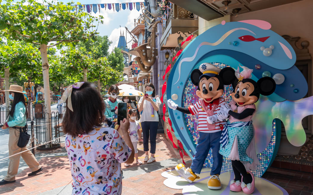 Few visitors are seen at the Shanghai Disney Resort in Shanghai, China, 7 August 2021.