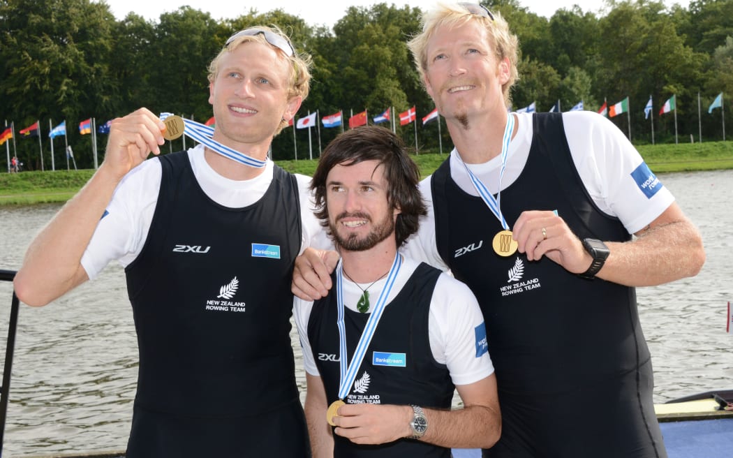 Hamish Bond, cox Caleb Shepherd and Eric Murray with their gold medals