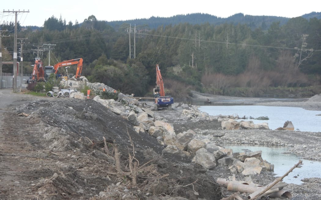 GREYMOUTH STAR/Brendon McMahon/SINGLE USE
Work on strengthening and raising the stop banks between the Westland Milk Products site and the Hokitika River on the southern side of the town is progressing, as seen on June 15.