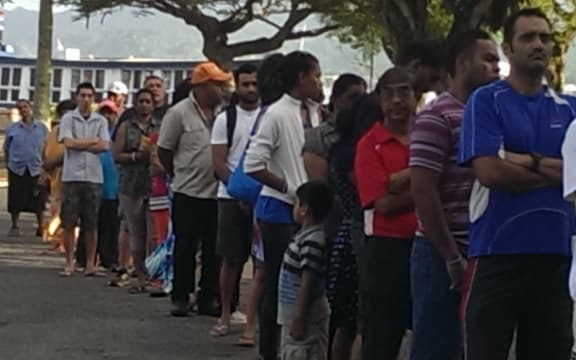 Voters in Fiji wait for the polls to open.