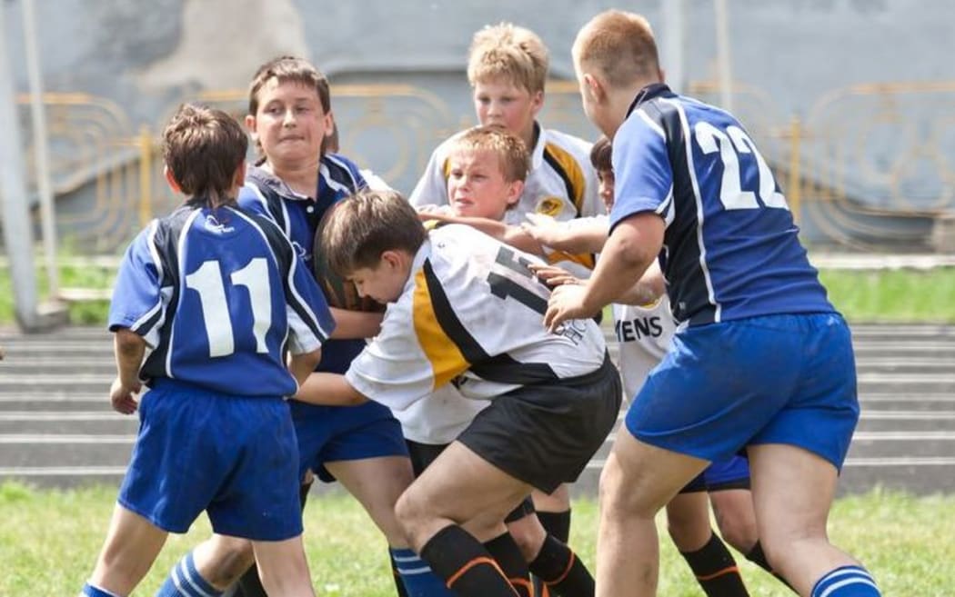 children playing rugby