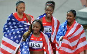 10.08.2012. London, England. the USA Runners Celebrate After the womens  4x100m Relay Final London 2012 Olympic Games The US team Won Gold Medal in This Event with A New World Record of 40 82