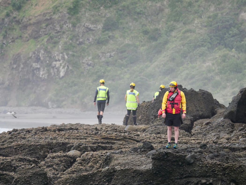 Searches are being carried out for a fisherman missing at O'Neill's Bay, near Bethell's Beach on Auckland's west coast.