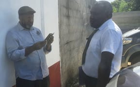 Former Vanuatu PM Charlot Salwai, (left), and lawyer Daniel Yahwah