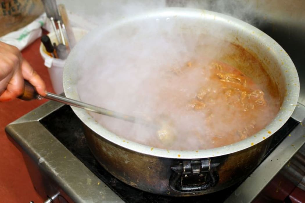 This is  an image of thirty servings of Hyderabad  lamb Biryani