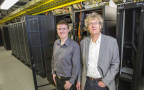Distinguished Professor Jack Copeland (right) and composer Jason Long (left) have restored the earliest known recording of computer-generated music, created more than 65 years ago.