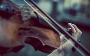 woman playing violin