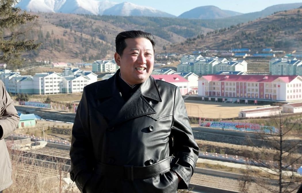 This undated picture released from North Korea's official Korean Central News Agency (KCNA) on November 16, 2021 shows North Korean leader Kim Jong Un (R) visiting Samjiyon city.