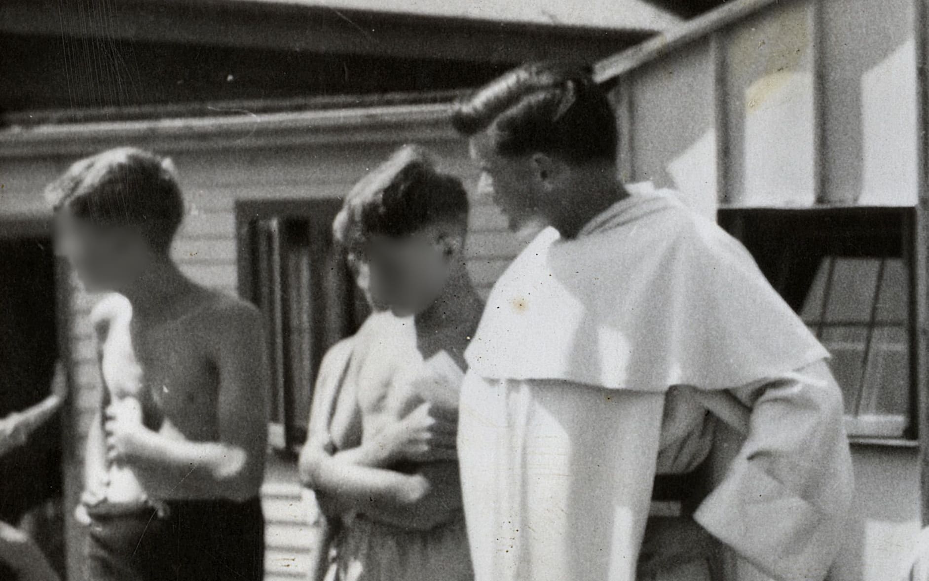 Rector Fred Durning, right, next to Father Michael Shirres, who  was recently exposed as a pedophile, with St Patrick’s College (Upper Hutt) students at a sports event in 1955.