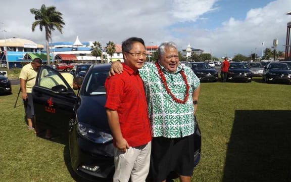 Chinese Ambassador in Samoa Wang Xuefeng and PM Tuila'epa Sa'ilele Malielegaoi at the presentation of 20 brand new Sedan vehicles for the Pacific Island Forum meeting to be hedl in Samoa next week.