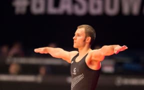 25.10.2015. Glasgow, Scotland. FIG Artistic Gymnastics World Championships. Day Three. Mikhail KOUDINOV (NZL) performs his Floor routine during the MAG Qualification.