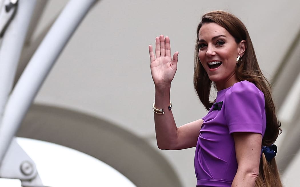 Britain's Catherine, Princess of Wales waves as she arrives at Wimbledon. 2024.