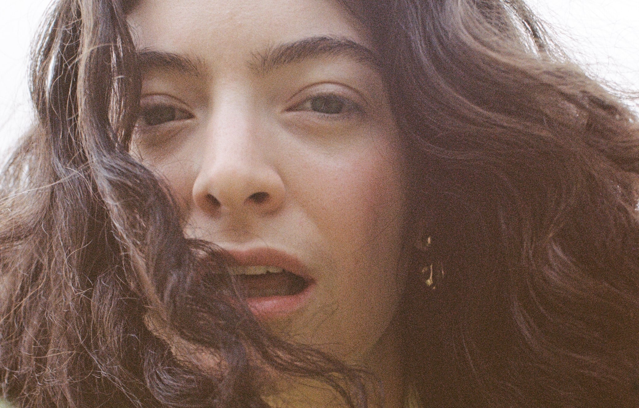 Lorde poses in yellow for her Solar Power album.