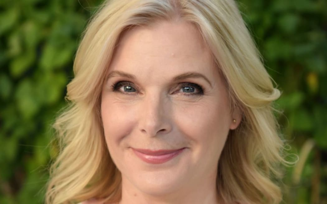 Jude smiles at the camera.