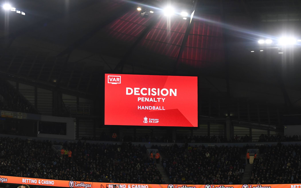 A VAR decision is posted on a screen in Britain.