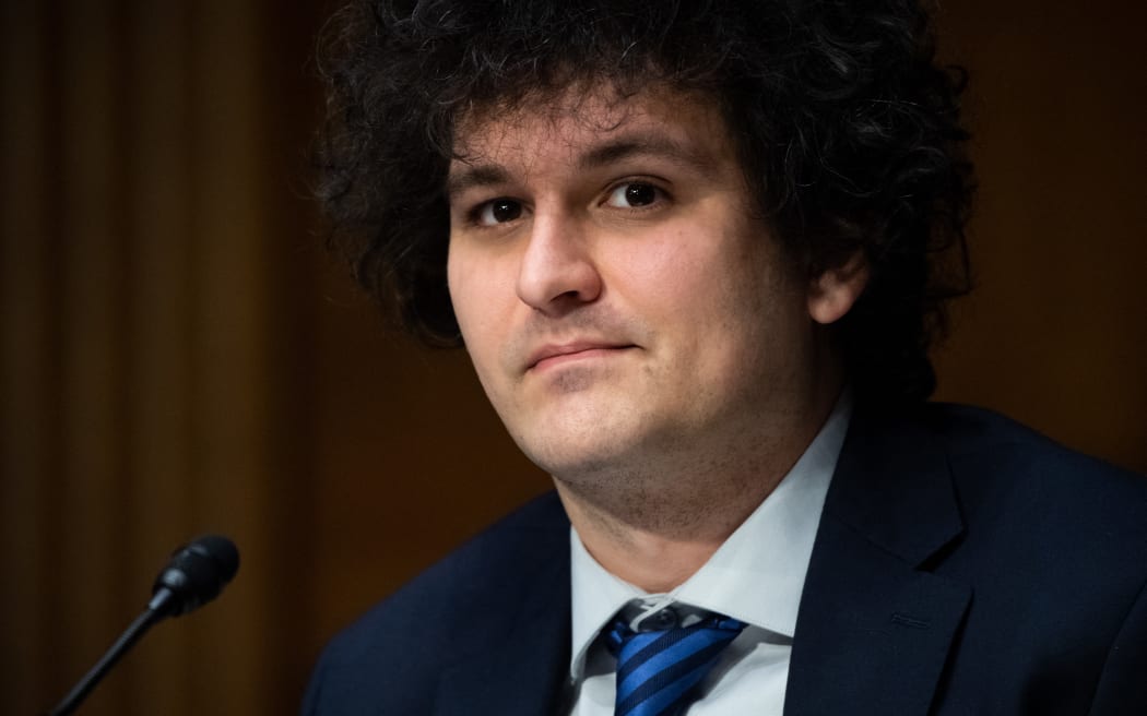 (FILES) In this file photo taken on February 09, 2022, Samuel Bankman-Fried, founder and CEO of FTX, testifies during a Senate Committee on Agriculture, Nutrition and Forestry hearing about "Examining Digital Assets: Risks, Regulation, and Innovation," on Capitol Hill in Washington, DC. - The new chief executive of troubled cryptocurrency platform FTX said on November 12, 2022, the company was making "every effort to secure all assets" following unauthorized transactions potentially worth hundreds of millions of dollars. Additionally, the platform's chief executive, 30-year-old Sam Bankman-Fried, once considered a star in the freewheeling cryptocurrency world, resigned. (Photo by SAUL LOEB / AFP)
