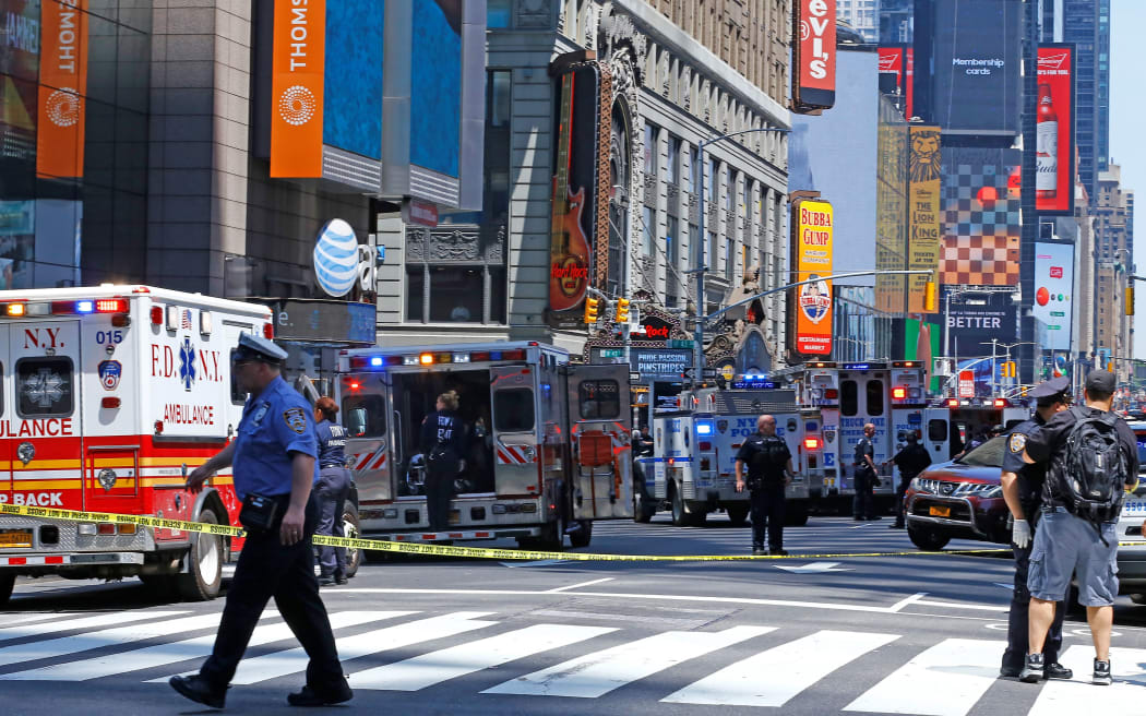 Ambulances at scene after the car mounted the footpath and drove into pedestrians on the corner of West 45th Street and Broadway at Times Square.