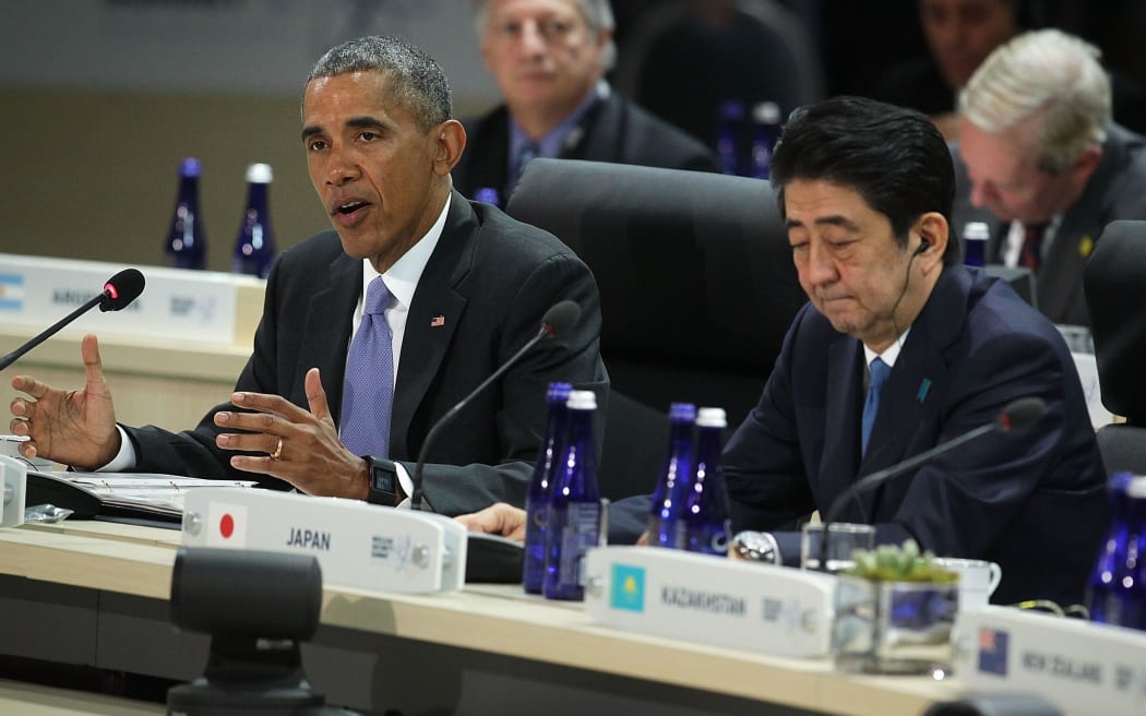 US President Barack Obama, left, and Japanese Prime Minister Shinzo Abe during a plenary session of the 2016 Nuclear Security Summit April 1, 2016 in Washington, DC.