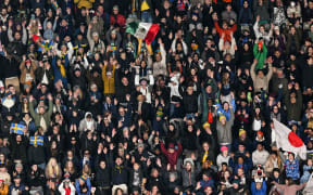 Spectators attend the Australia and New Zealand 2023 Women's World Cup quarter-final football match between Japan and Sweden at Eden Park in Auckland on 11 August, 2023.