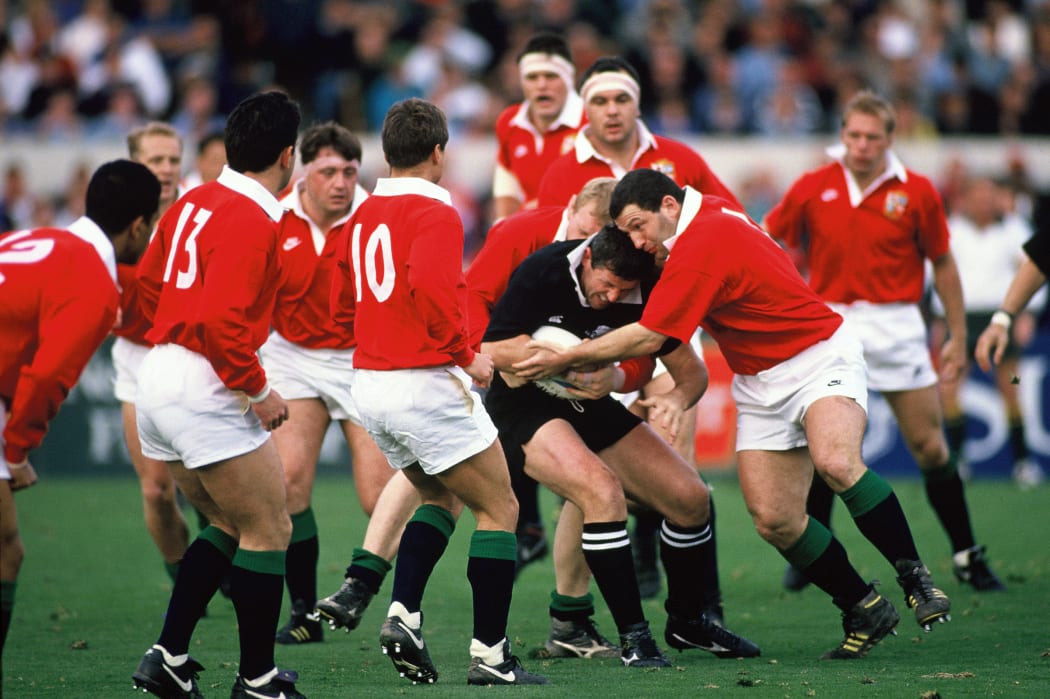 Sean Fitzpatrick tackled during the first All Blacks v Lions Test at Lancaster Park, Christchurch on 12 June 1993.