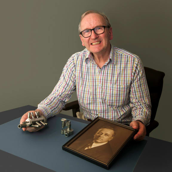 John Daysh with a picture of his grandfather Norman