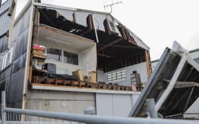 A building in Levin is seen with its wall missing following the storm that ripped through the town on 20 May, 2022.