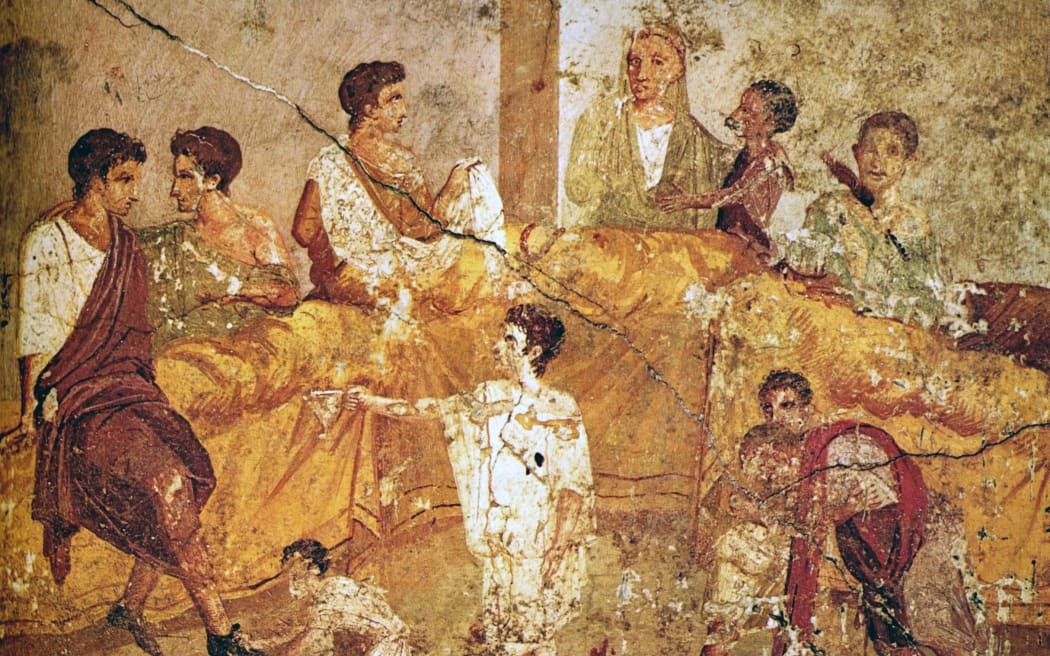 A fresco (circa 50 CE) from the House of the Triclinium, Pompeii, showing a banquet scene.